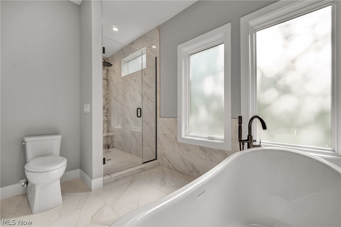 4009 Brainard Road Beachwood, OH 44122 - Photo 27 of 50 Bathroom featuring toilet and shower with separate bathtub