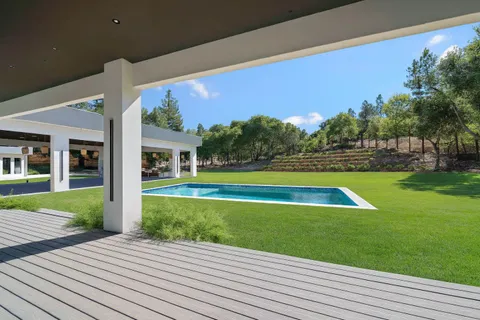 a view of a house with a swimming pool
