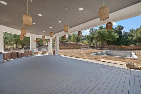 a view of a swimming pool and outdoor space