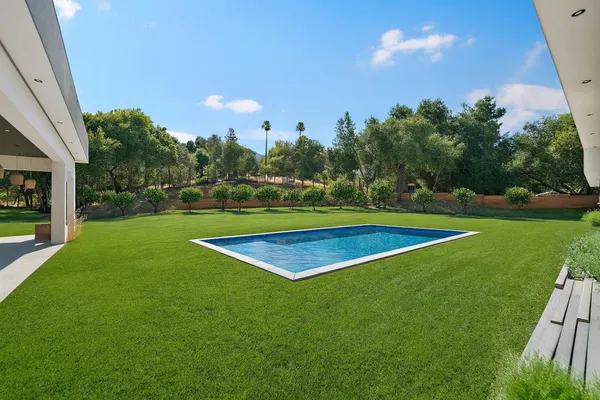 a view of a golf course with a lake