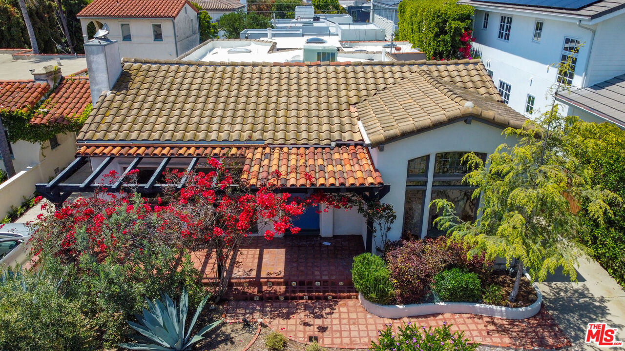 a view of entryway with flower pots