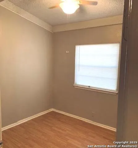 a view of a window in an empty room