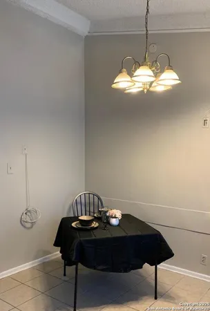a view of a chandelier in a room