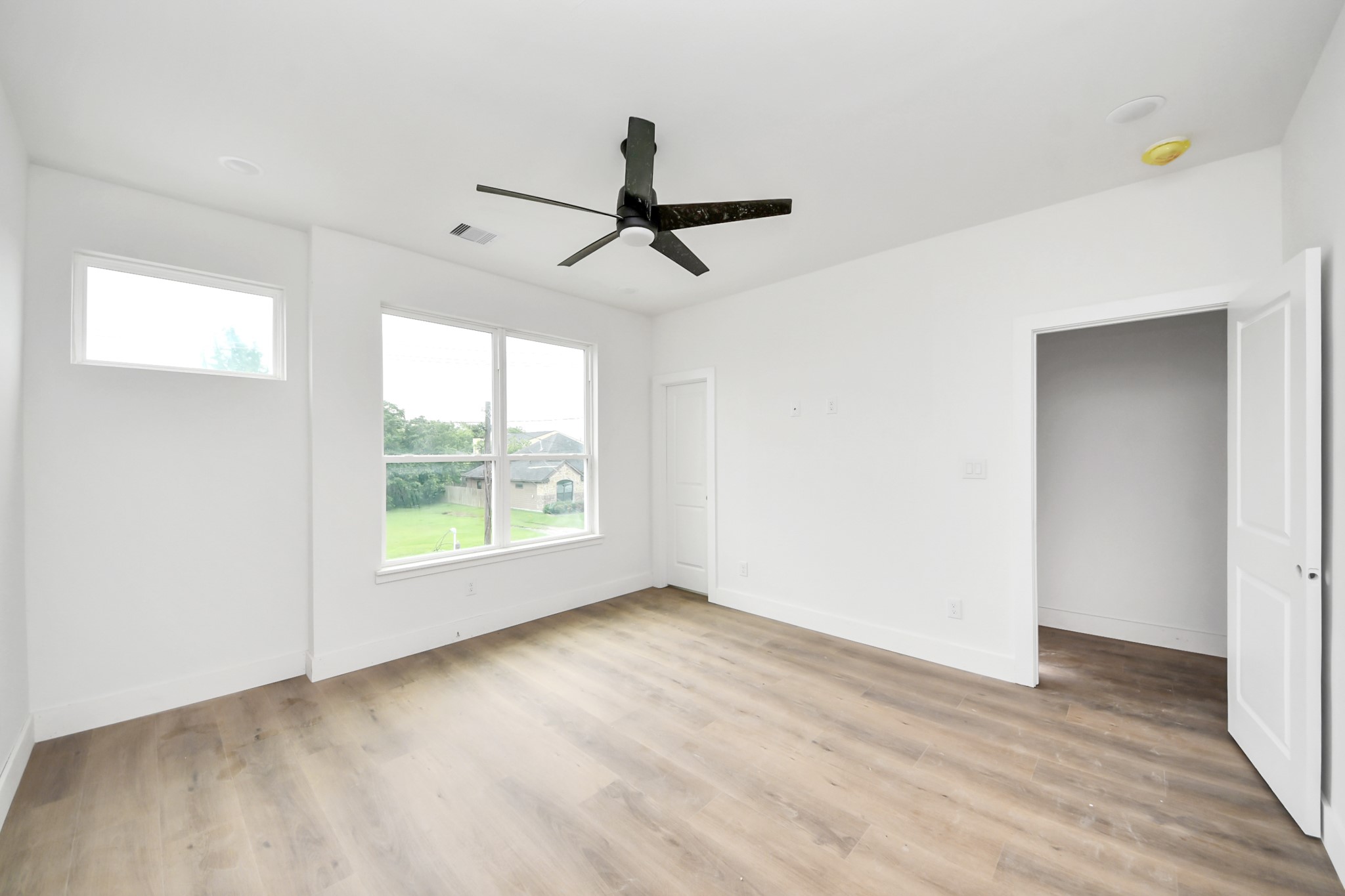 8206 Colonial Lane Houston, TX 77051 - Photo 25 of 31 a view of room window and wooden floor