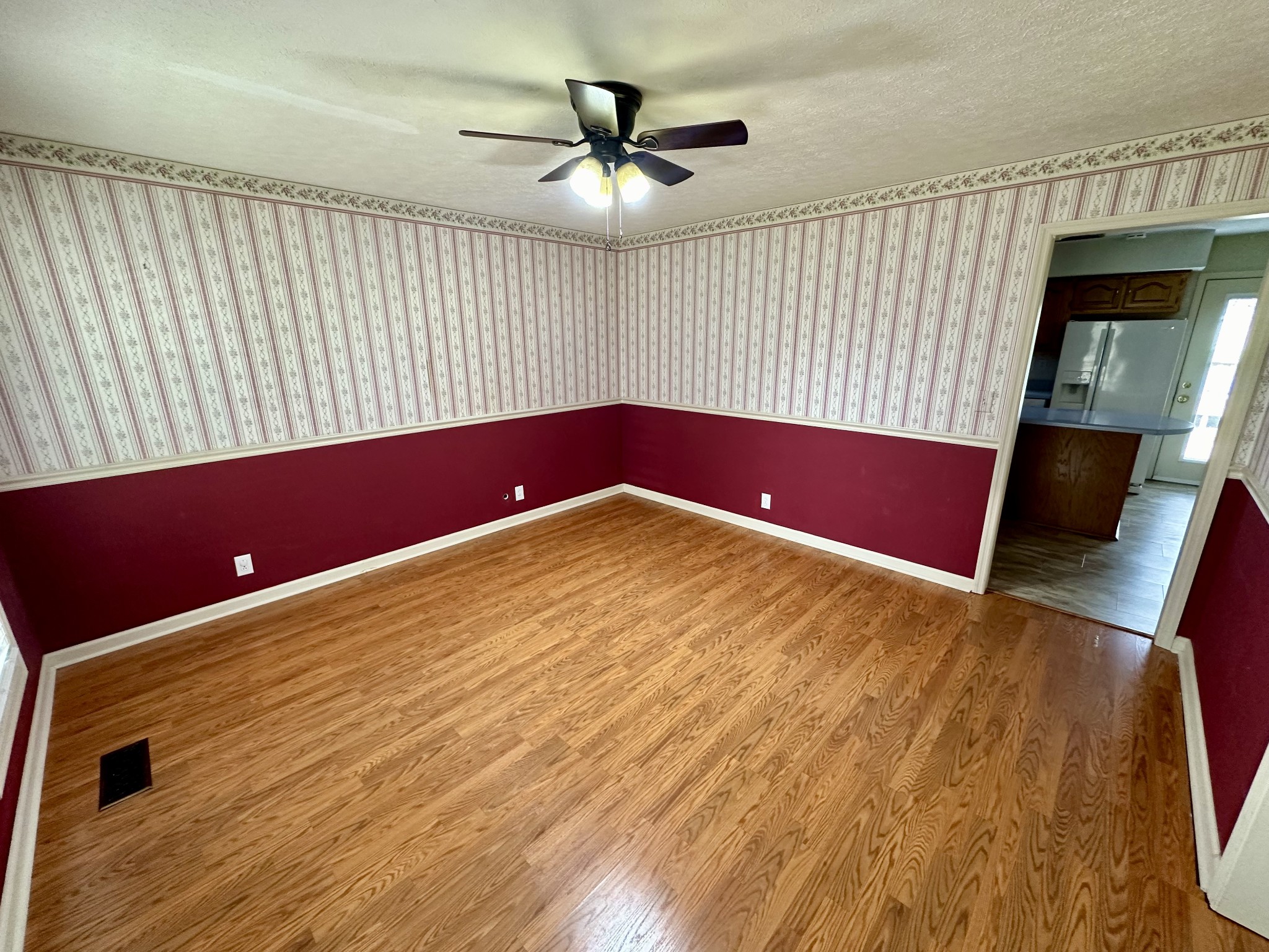654 Denning Ford Road Portland, TN 37148 - Photo 11 of 39 a view of livingroom with furniture wooden floor and window