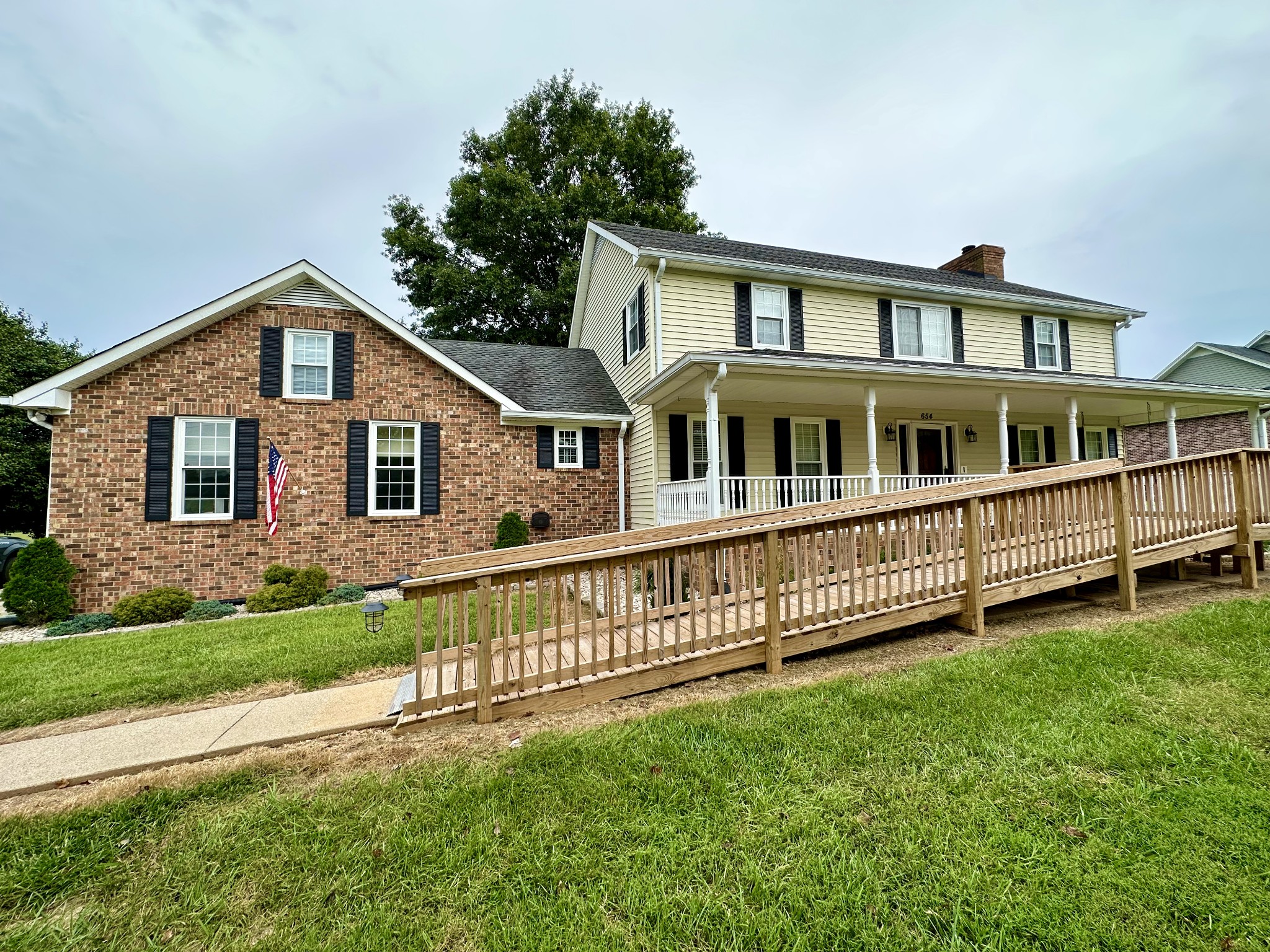 654 Denning Ford Road Portland, TN 37148 - Photo 2 of 39 a view of a house with a yard and sitting area