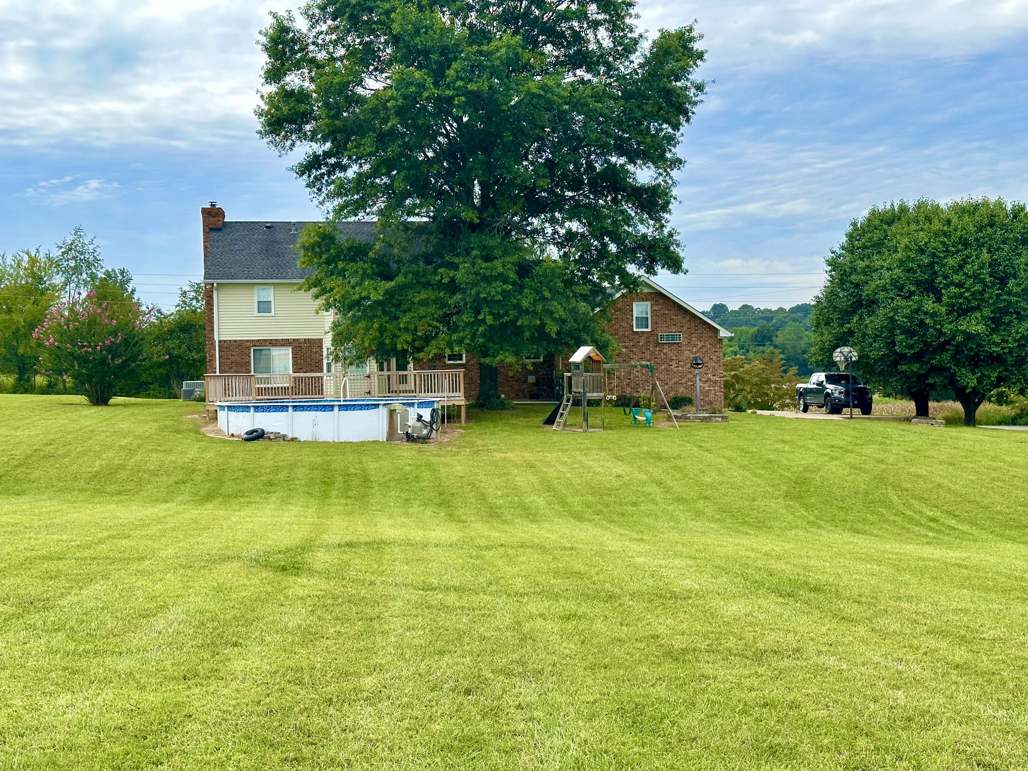 654 Denning Ford Road Portland, TN 37148 - Photo 30 of 39 a view of a house with a swimming pool