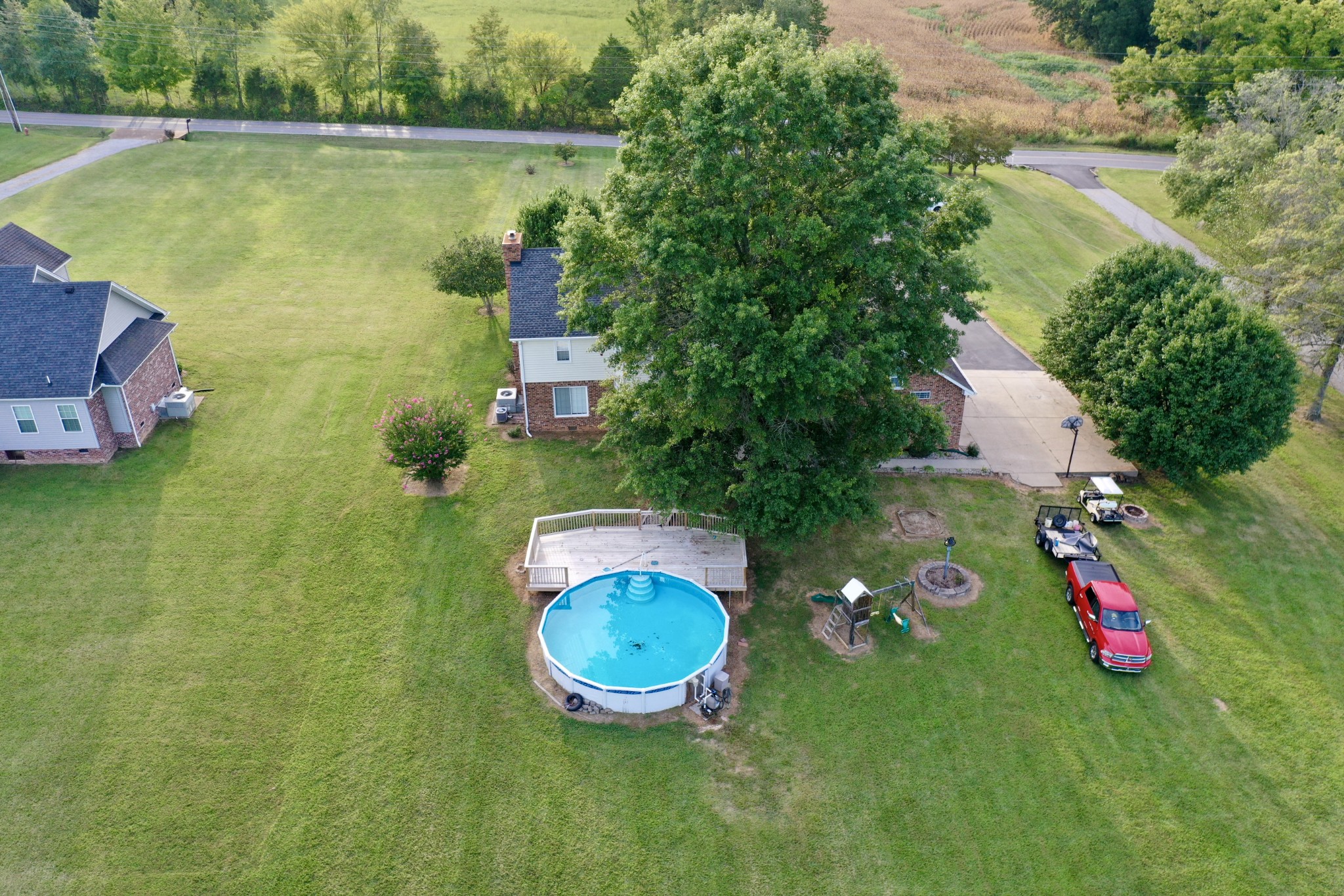 654 Denning Ford Road Portland, TN 37148 - Photo 31 of 39 an aerial view of a house with swimming pool and lake view