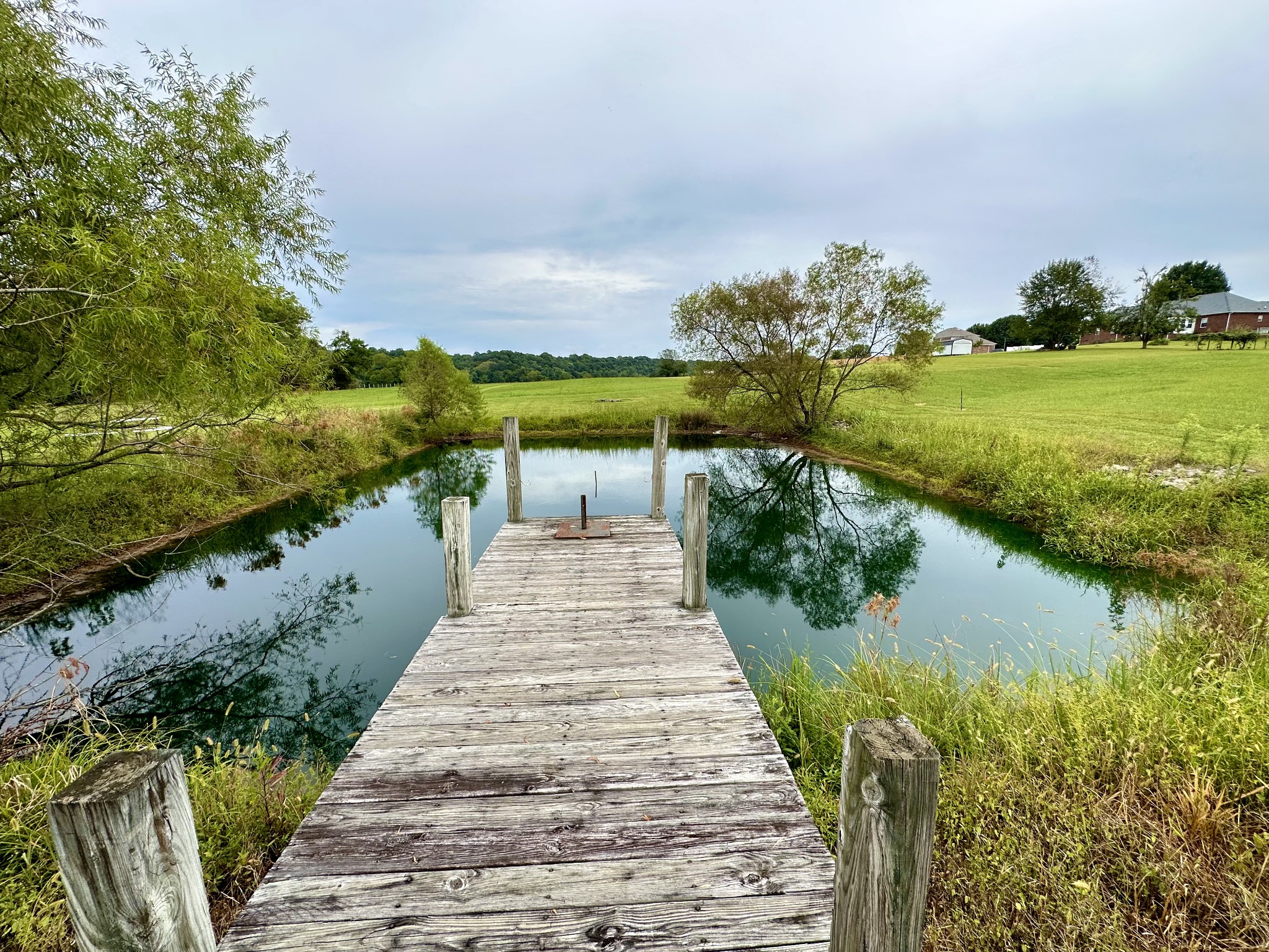 654 Denning Ford Road Portland, TN 37148 - Photo 35 of 39 a view of a lake with a floor to ceiling windows