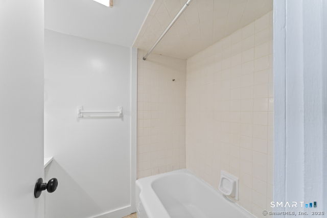 3 Riverside Road, Unit B Newtown, CT 06482 - Photo 14 of 20 a bathroom with a sink and shower