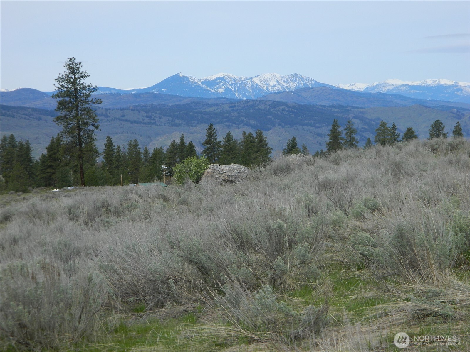 0 Tbd Six Gun Way Oroville, WA 98844 - Photo 5 of 14 a view of a backyard with mountain view