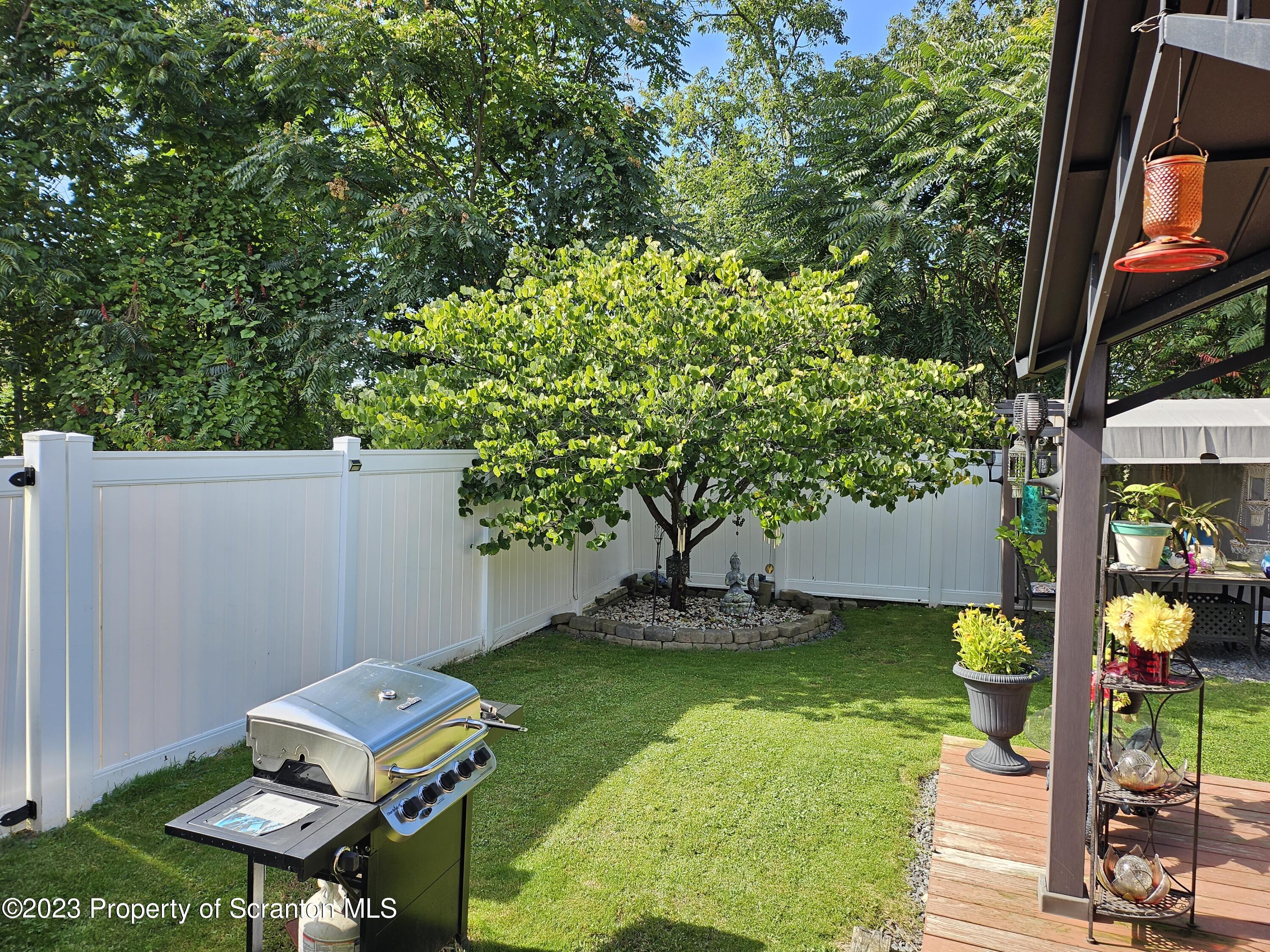 740 Weavertown Road Shavertown, PA 18708 - Photo 18 of 82 a backyard of a house with seating space