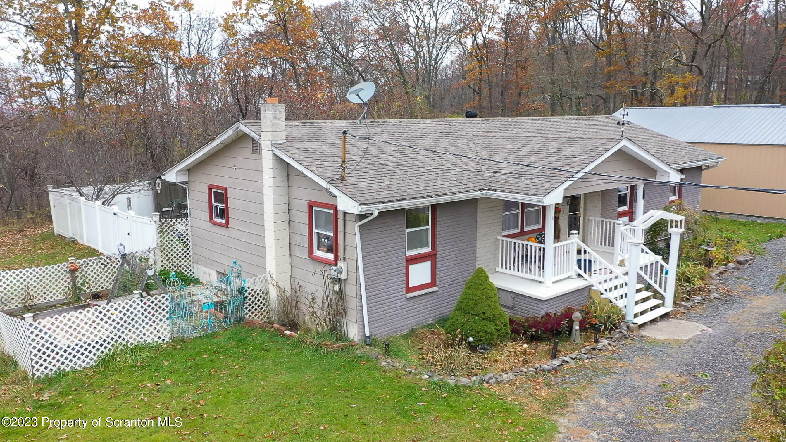 740 Weavertown Road Shavertown, PA 18708 - Photo 3 of 82 a view of a house with a yard and sitting area