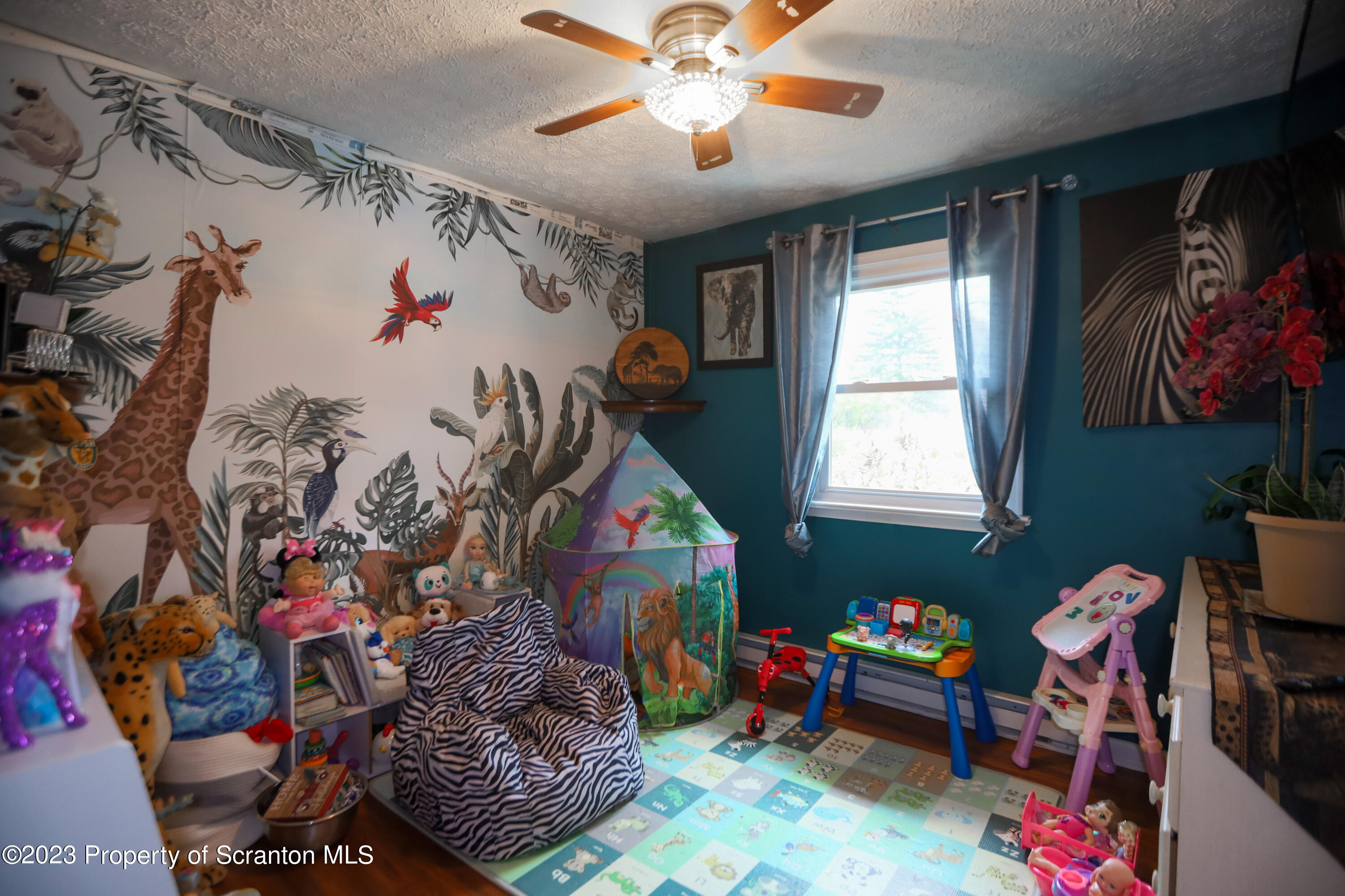 740 Weavertown Road Shavertown, PA 18708 - Photo 45 of 82 a room with toys and a window