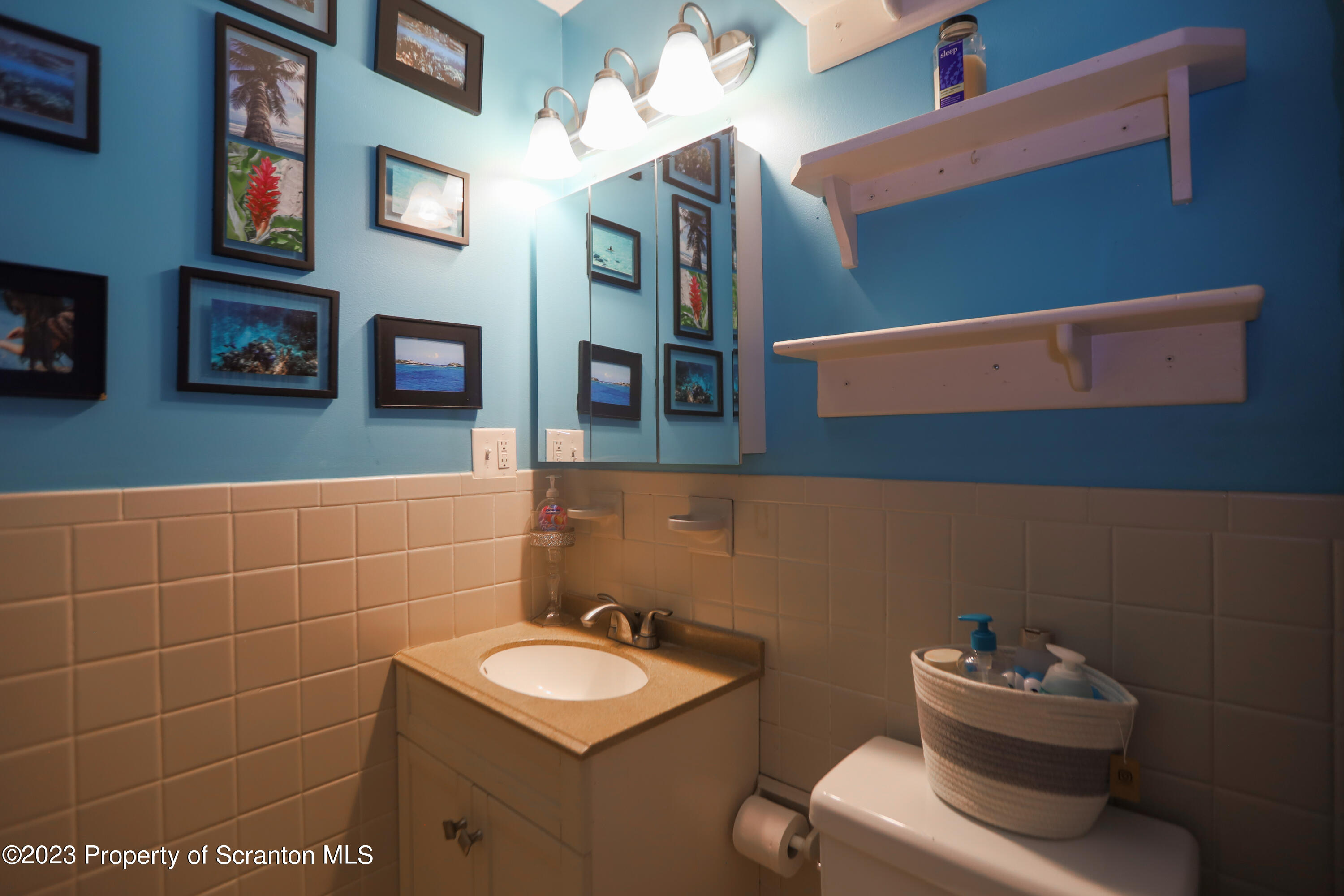 740 Weavertown Road Shavertown, PA 18708 - Photo 49 of 82 a bathroom with a toilet sink and mirror
