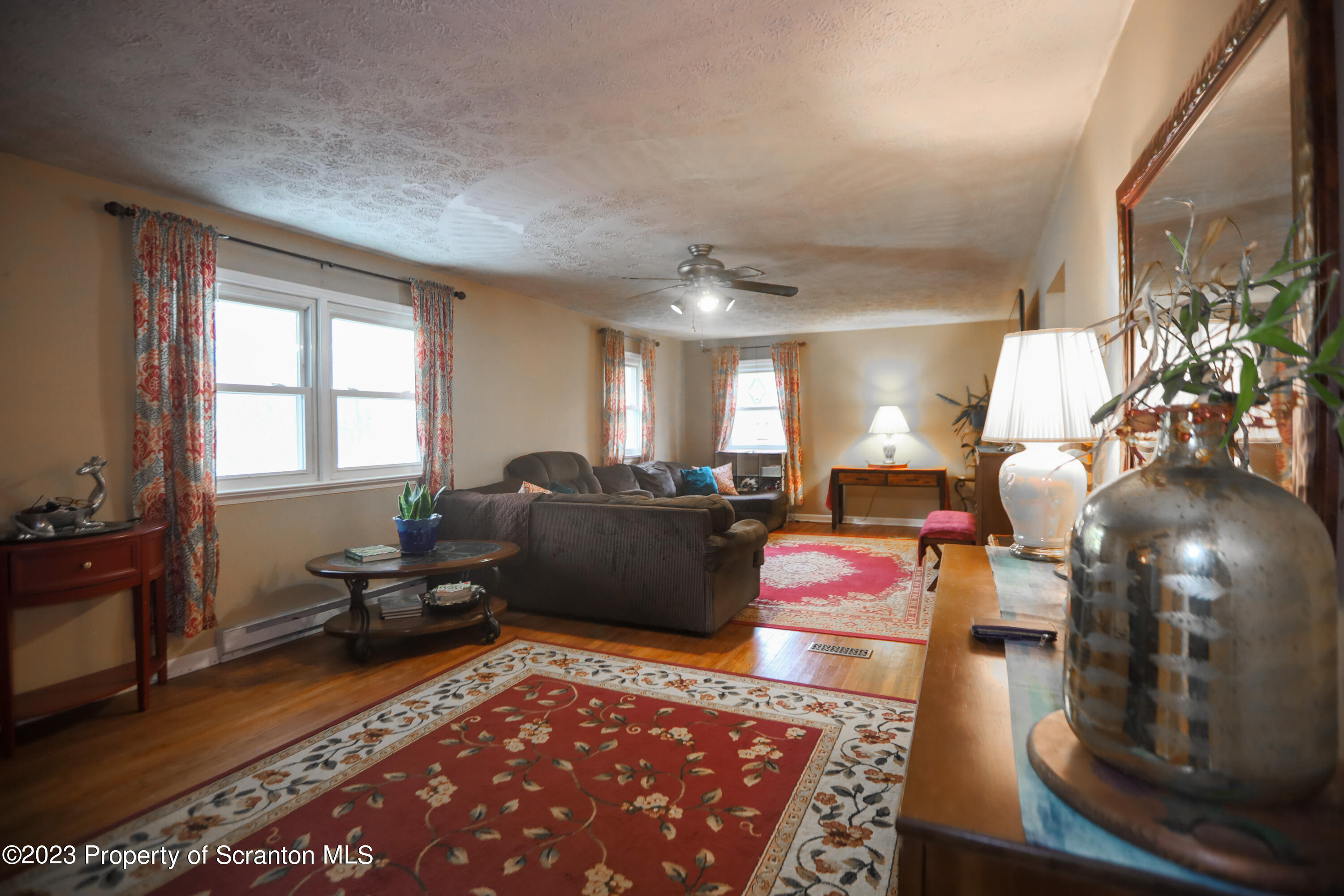 740 Weavertown Road Shavertown, PA 18708 - Photo 55 of 82 a living room with furniture rug and window