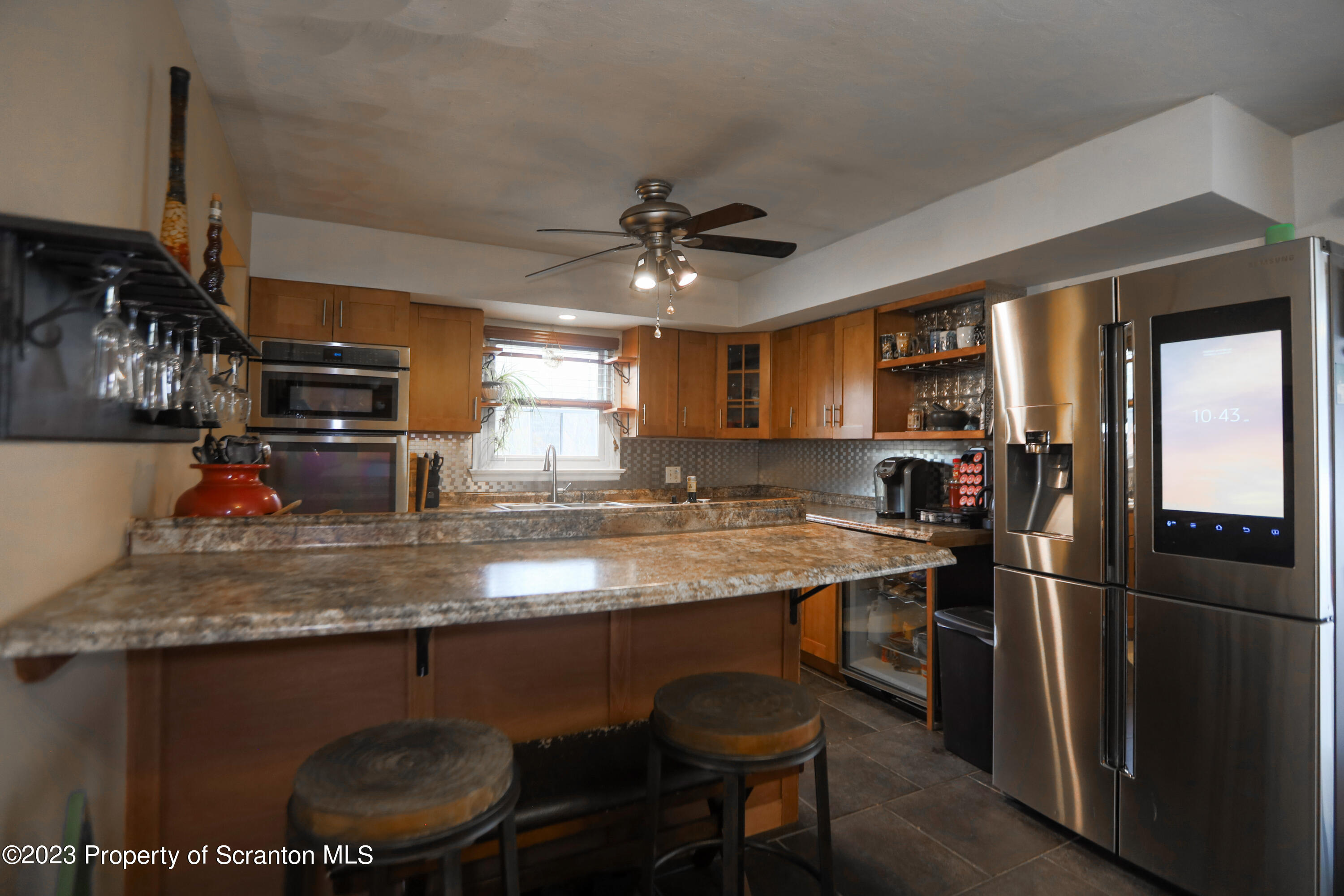740 Weavertown Road Shavertown, PA 18708 - Photo 58 of 82 a kitchen with stainless steel appliances granite countertop a sink refrigerator and cabinets