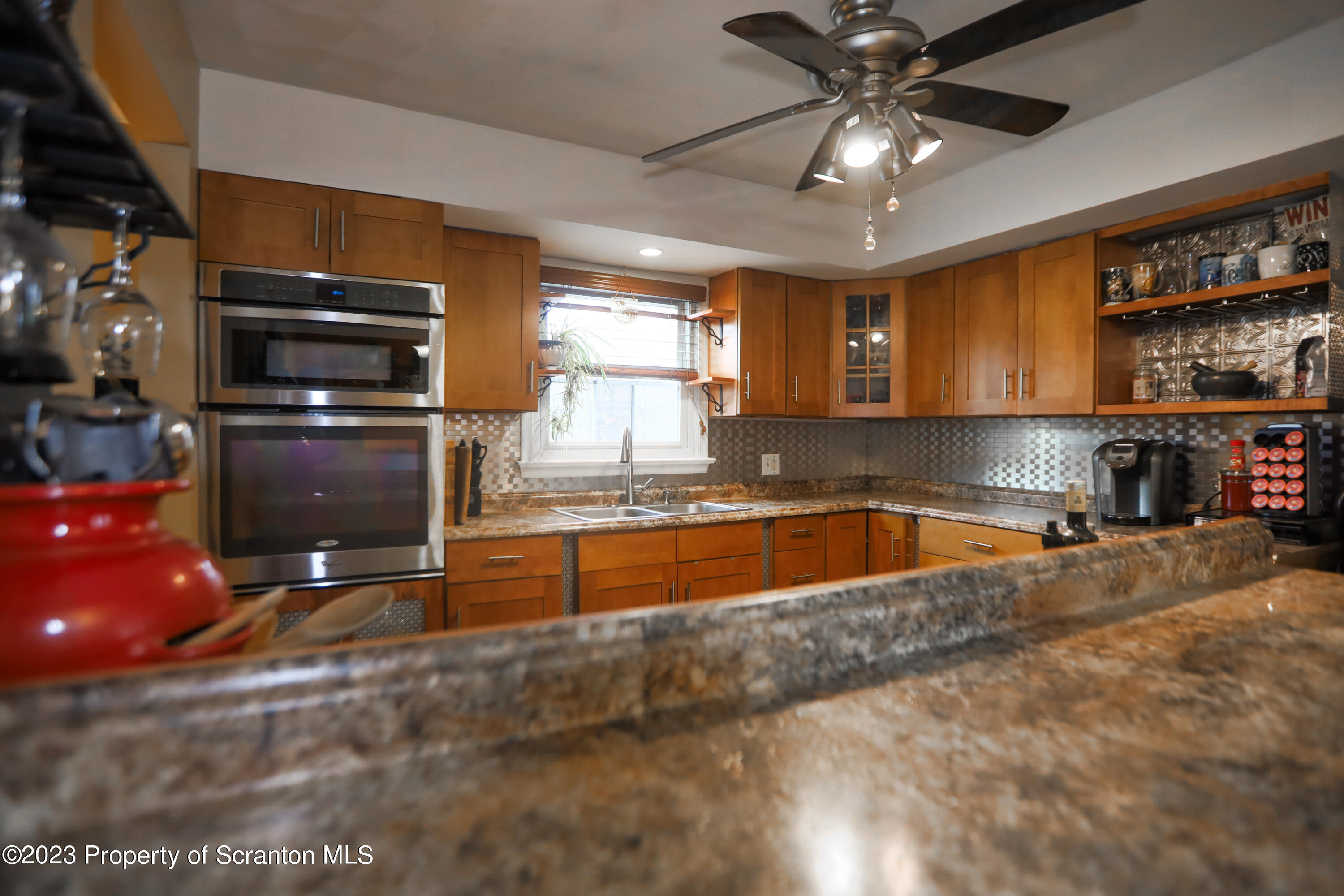 740 Weavertown Road Shavertown, PA 18708 - Photo 59 of 82 a kitchen with stainless steel appliances granite countertop a sink window and cabinets