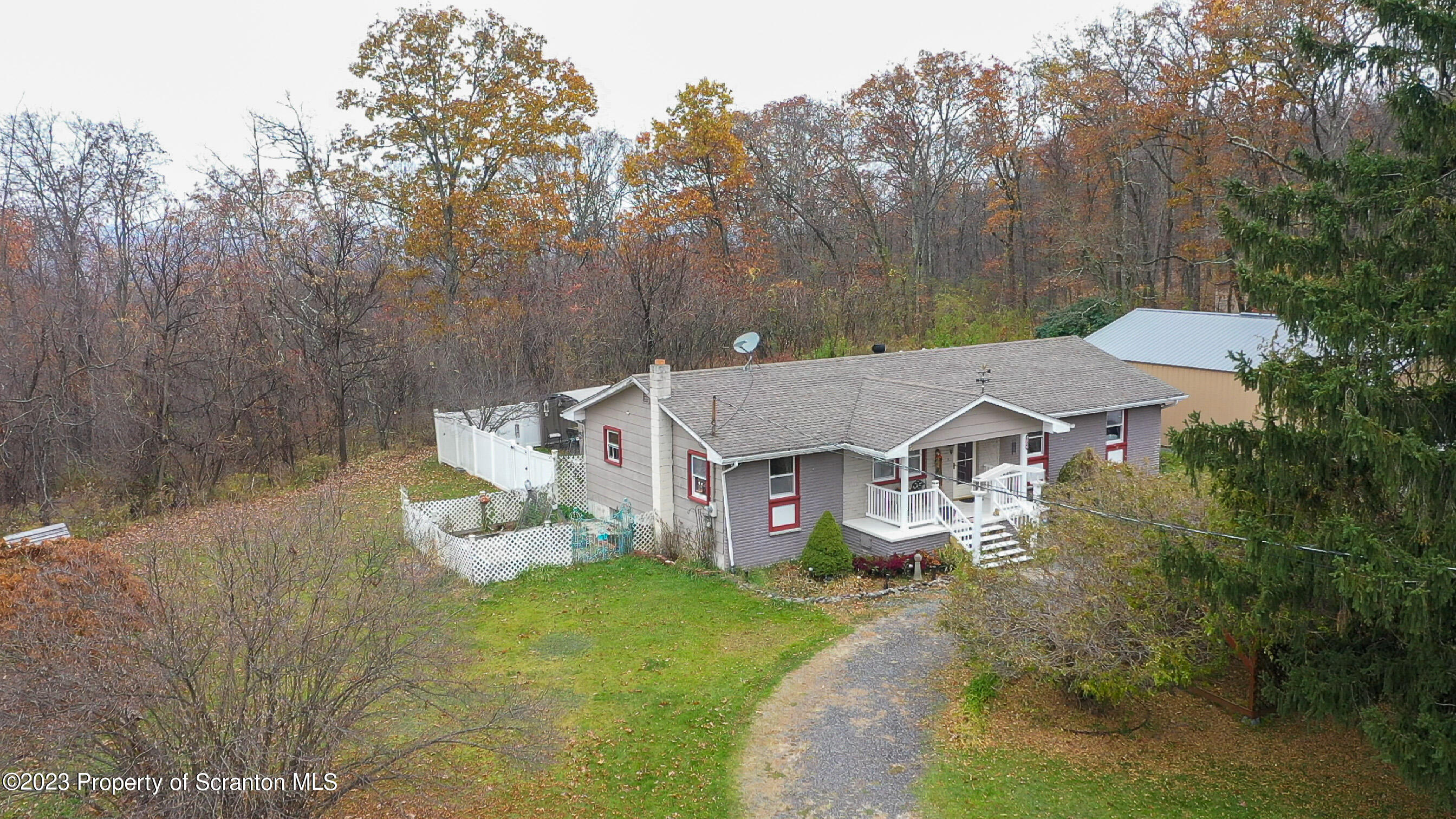 740 Weavertown Road Shavertown, PA 18708 - Photo 66 of 82 a view of a house with a yard table and chairs