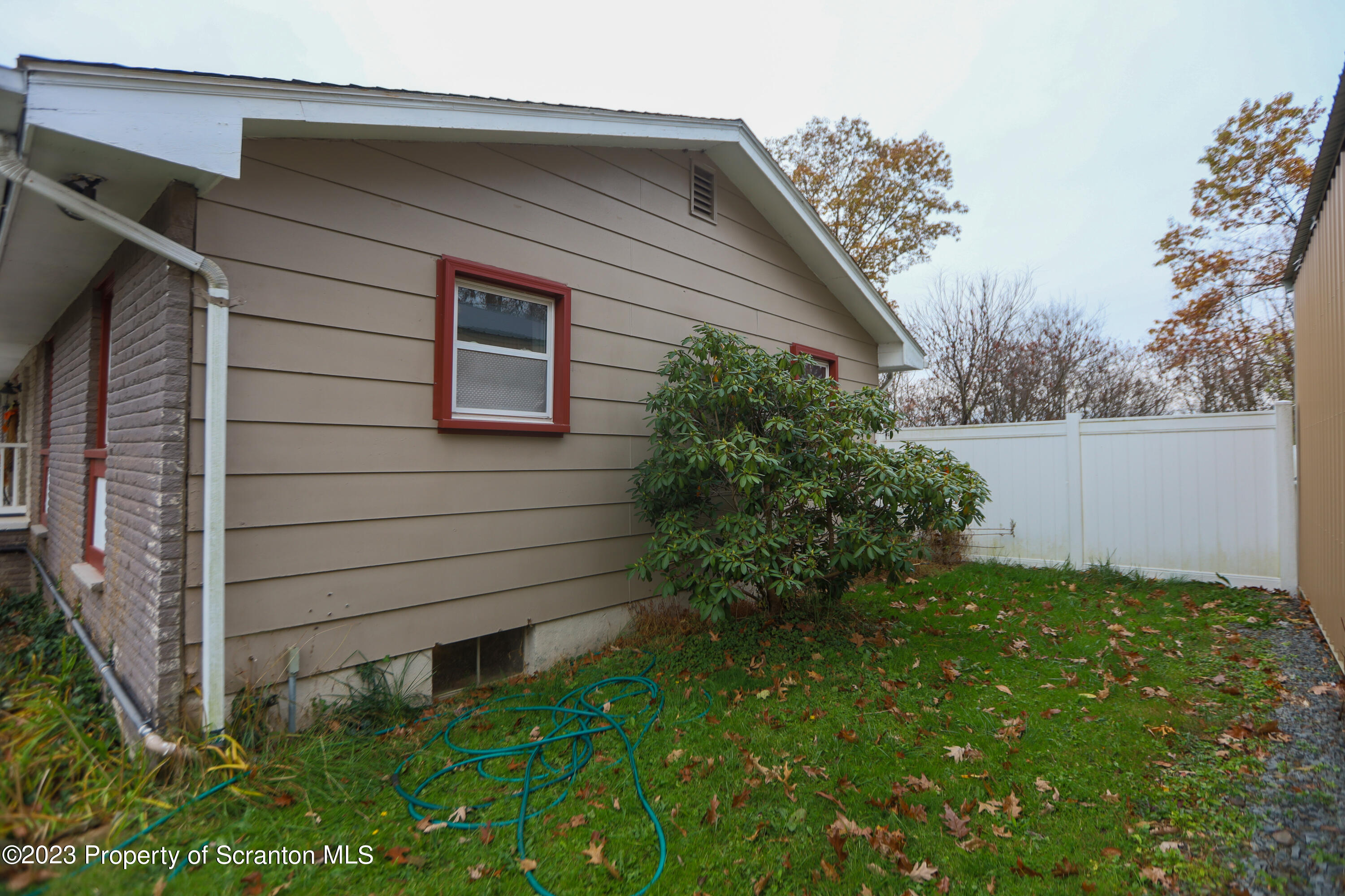 740 Weavertown Road Shavertown, PA 18708 - Photo 8 of 82 a view of backyard with potted plants and large tree