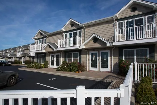 a front view of a house with a porch