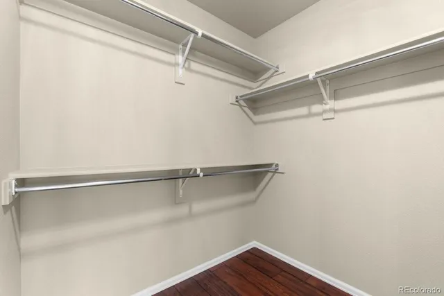 a view of an empty walk in closet