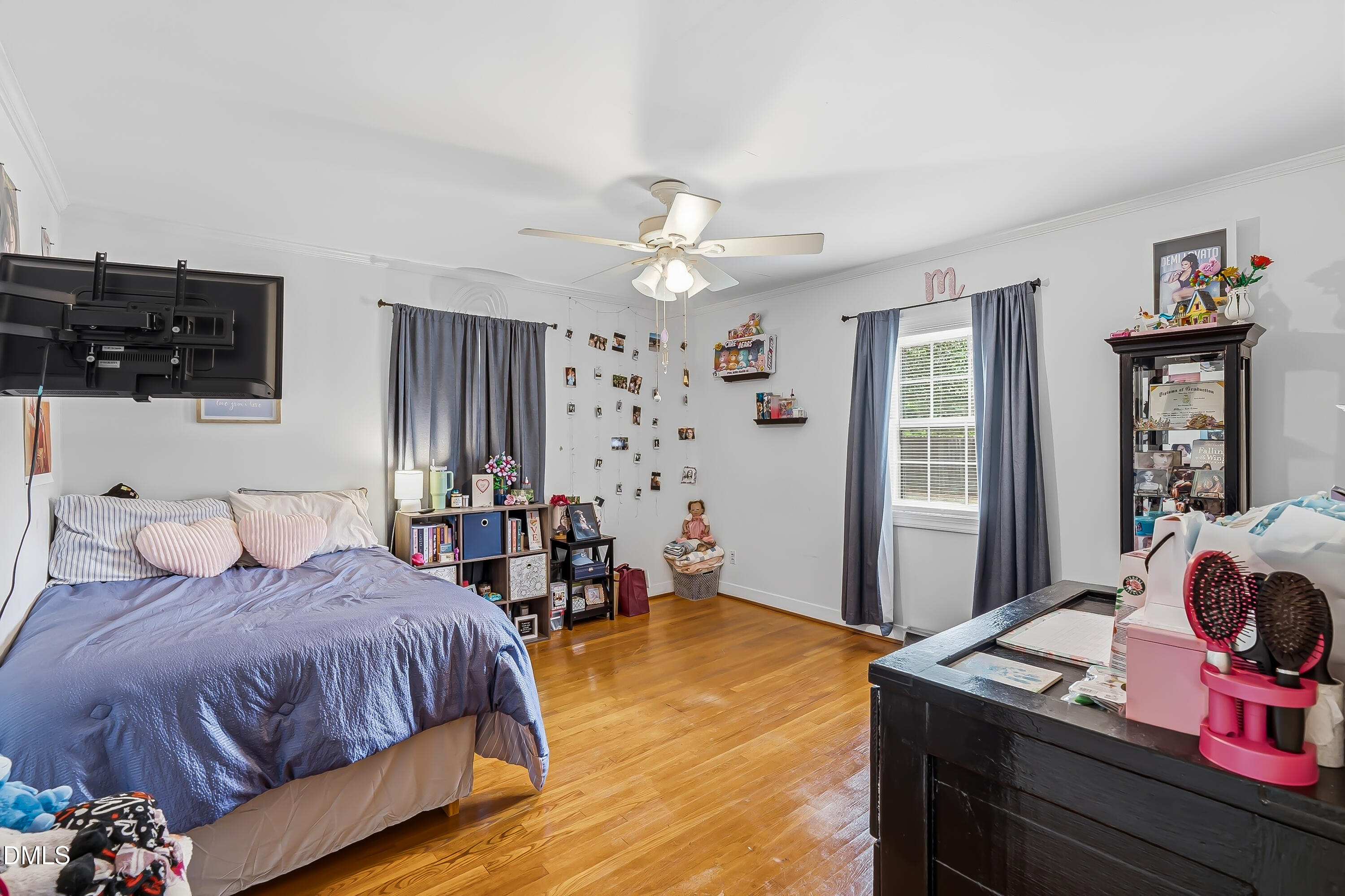 4967 Highway 581 Spring Hope, NC 27882 - Photo 30 of 44 a bedroom with a bed and a flat screen tv
