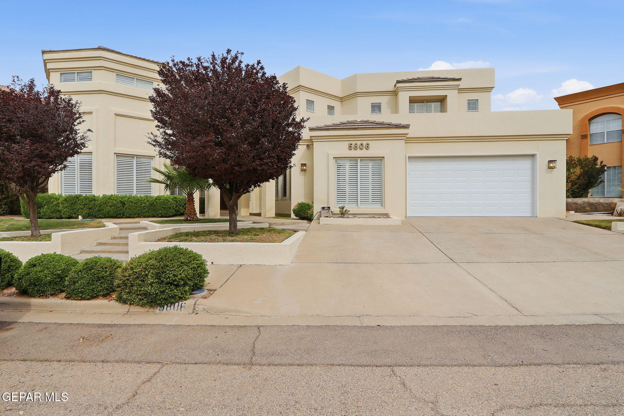 5806 Diamond Point Circle El Paso, TX 79912 - Photo 1 of 61 a front view of a house with a yard