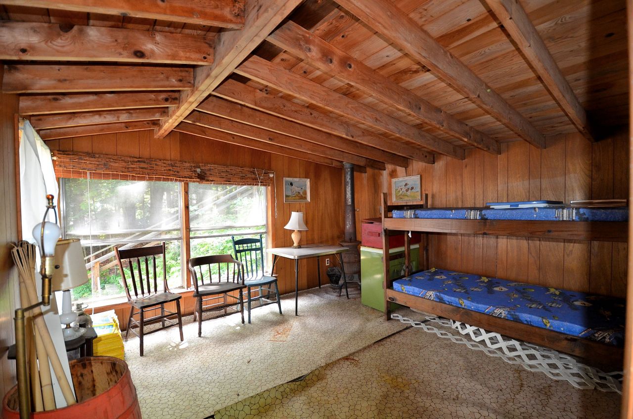 405 Stanley Road Otis, MA 01029 - Photo 13 of 16 a view of a patio with a table and chairs