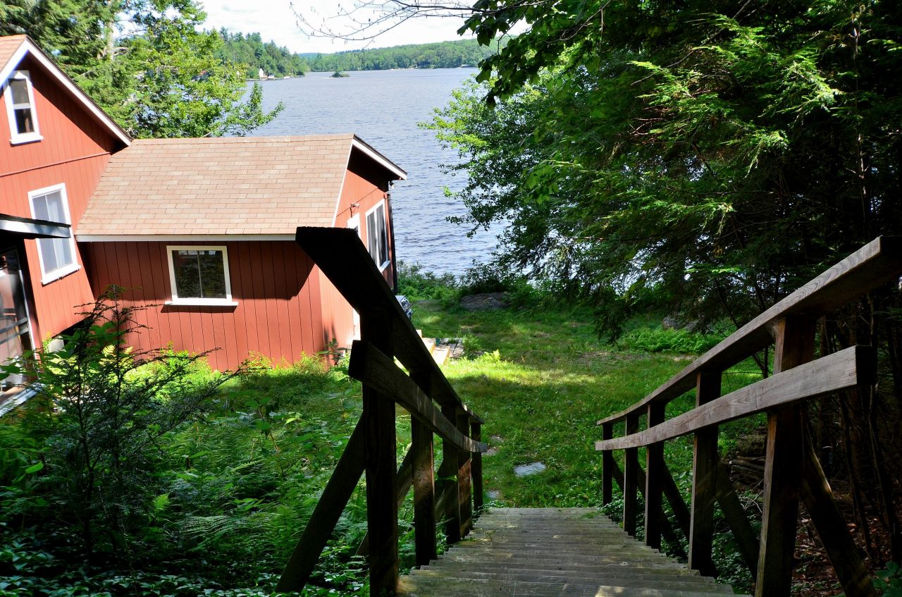 405 Stanley Road Otis, MA 01029 - Photo 3 of 16 a view of a house with a tree