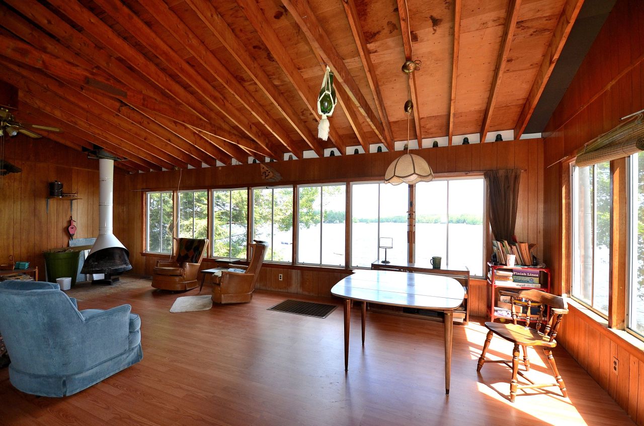 405 Stanley Road Otis, MA 01029 - Photo 9 of 16 a living room with furniture and a large window