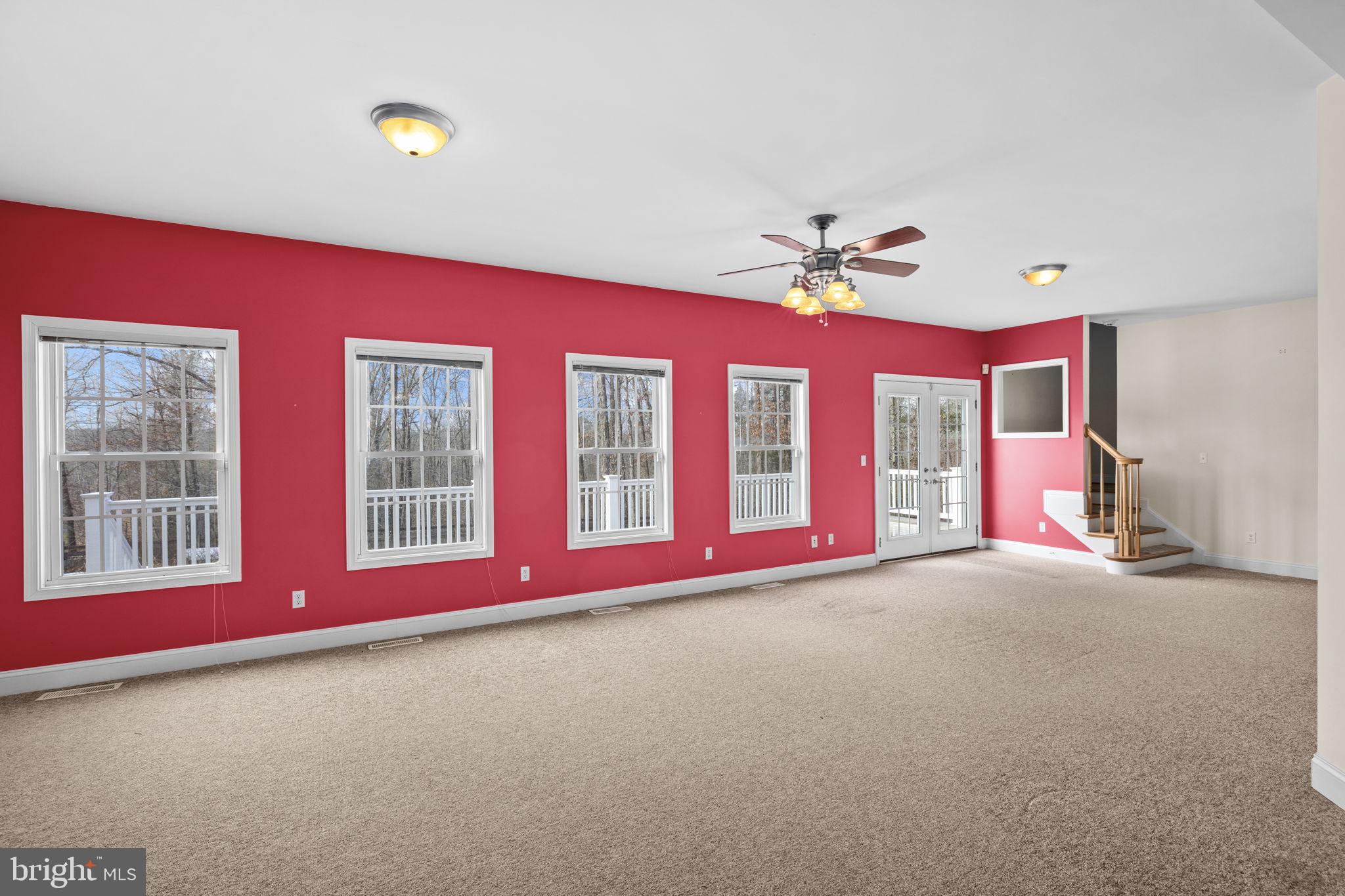 2481 Yanceyville Road Louisa, VA 23093 - Photo 11 of 66 a view of a livingroom with a ceiling fan and window