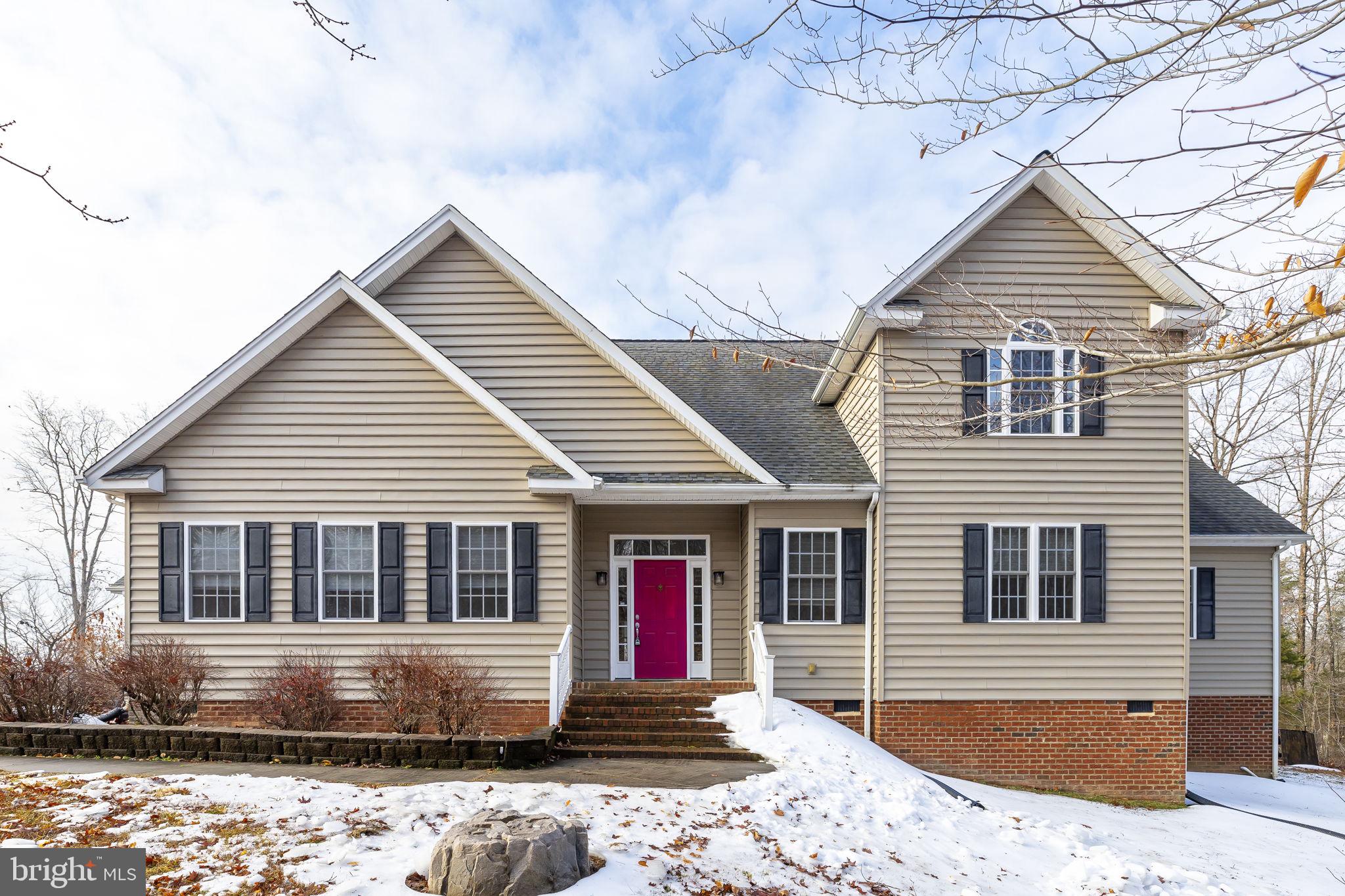 2481 Yanceyville Road Louisa, VA 23093 - Photo 2 of 66 a front view of a house with a yard