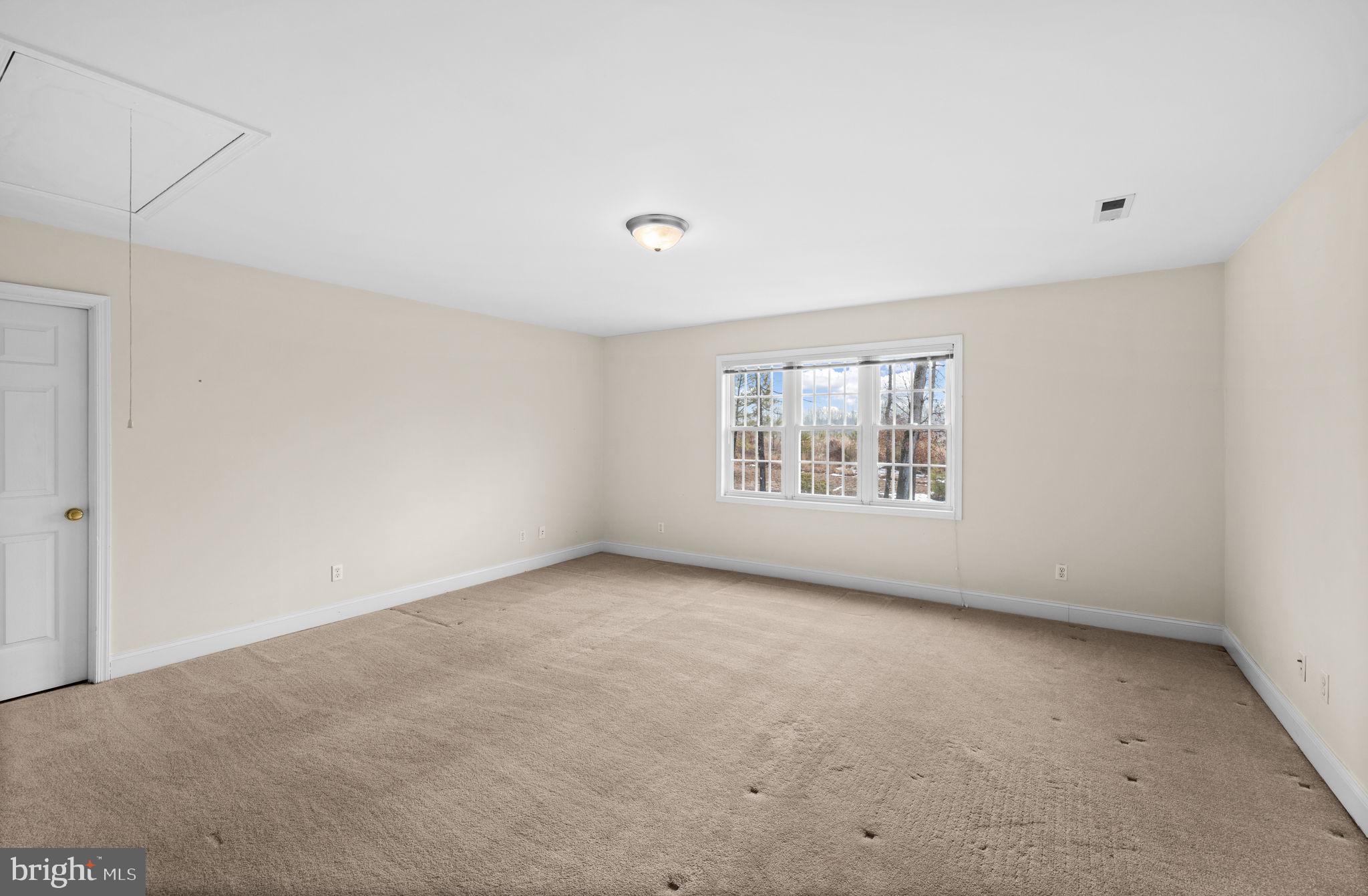 2481 Yanceyville Road Louisa, VA 23093 - Photo 44 of 66 an empty room with windows