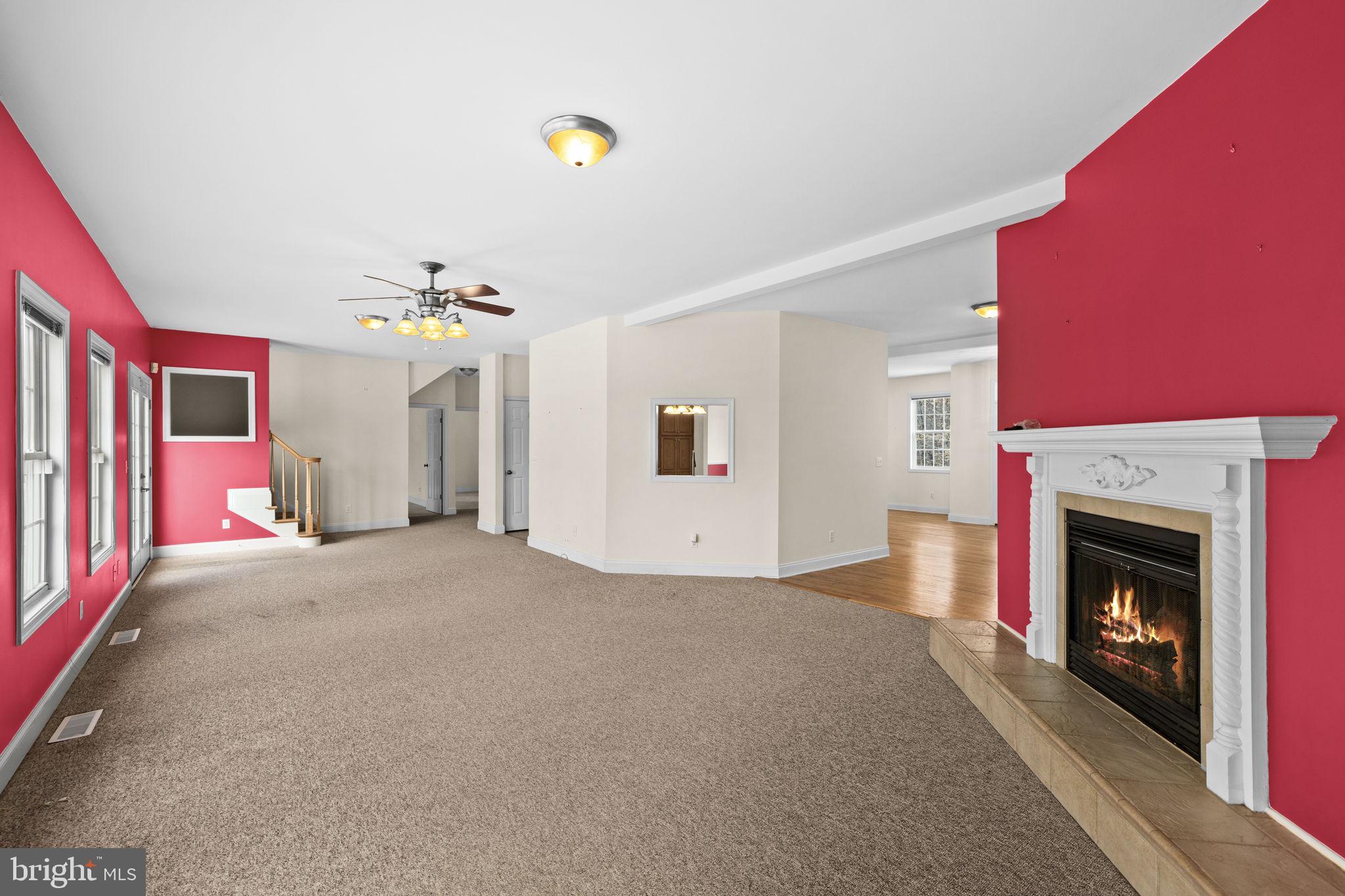 2481 Yanceyville Road Louisa, VA 23093 - Photo 6 of 66 a view of a livingroom with a fireplace and window
