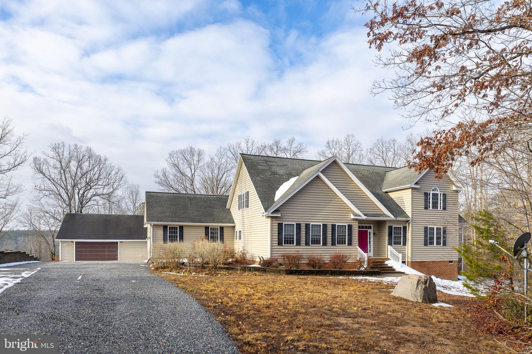 2481 Yanceyville Road Louisa, VA 23093 - Photo 65 of 66 a view of house with a big yard and large tree