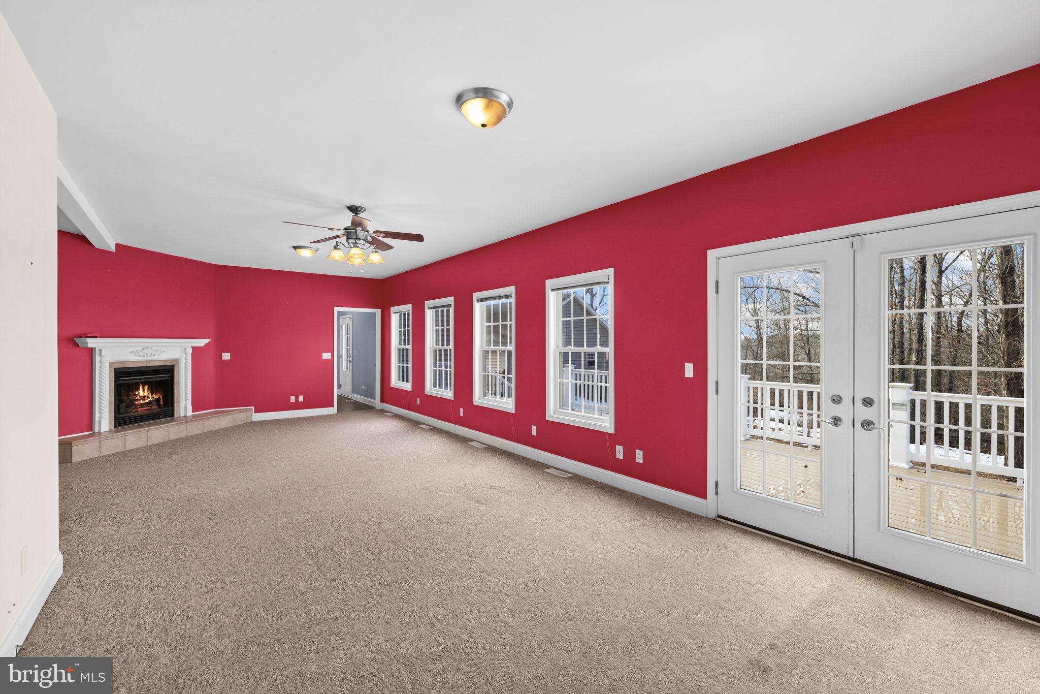 2481 Yanceyville Road Louisa, VA 23093 - Photo 9 of 66 a view of an empty room with a fireplace
