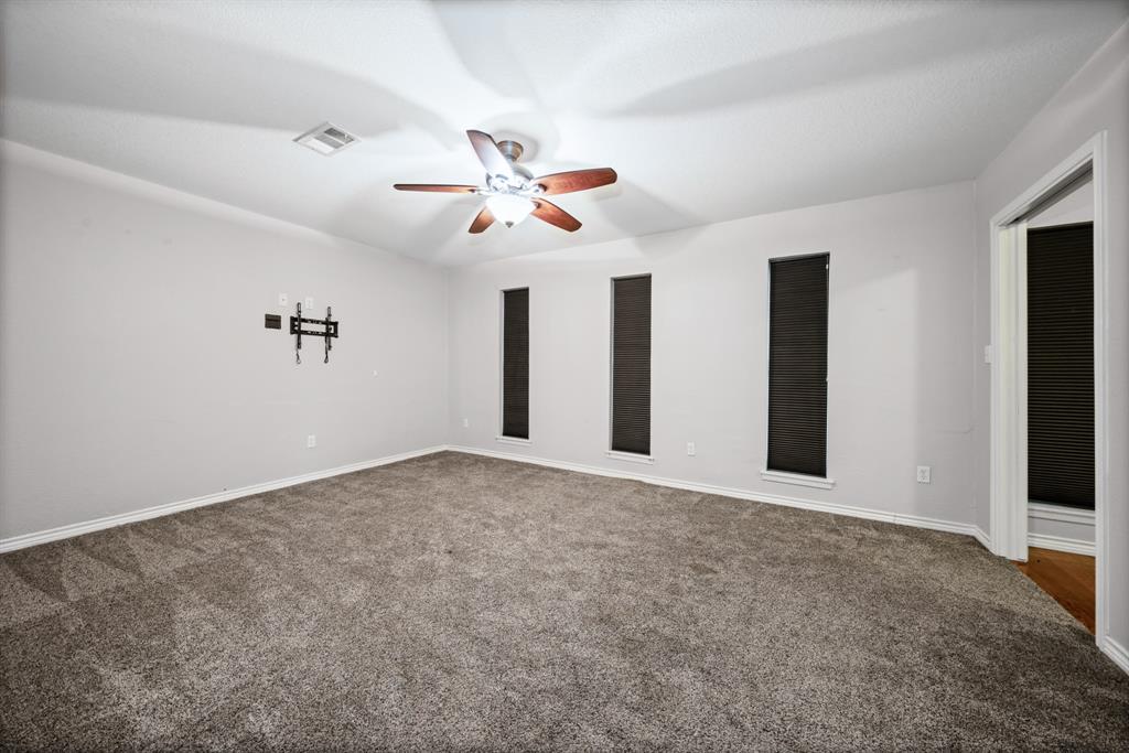 891 HCR 2124 Loop Whitney, TX 76692 - Photo 27 of 40 a view of an empty room with a ceiling fan
