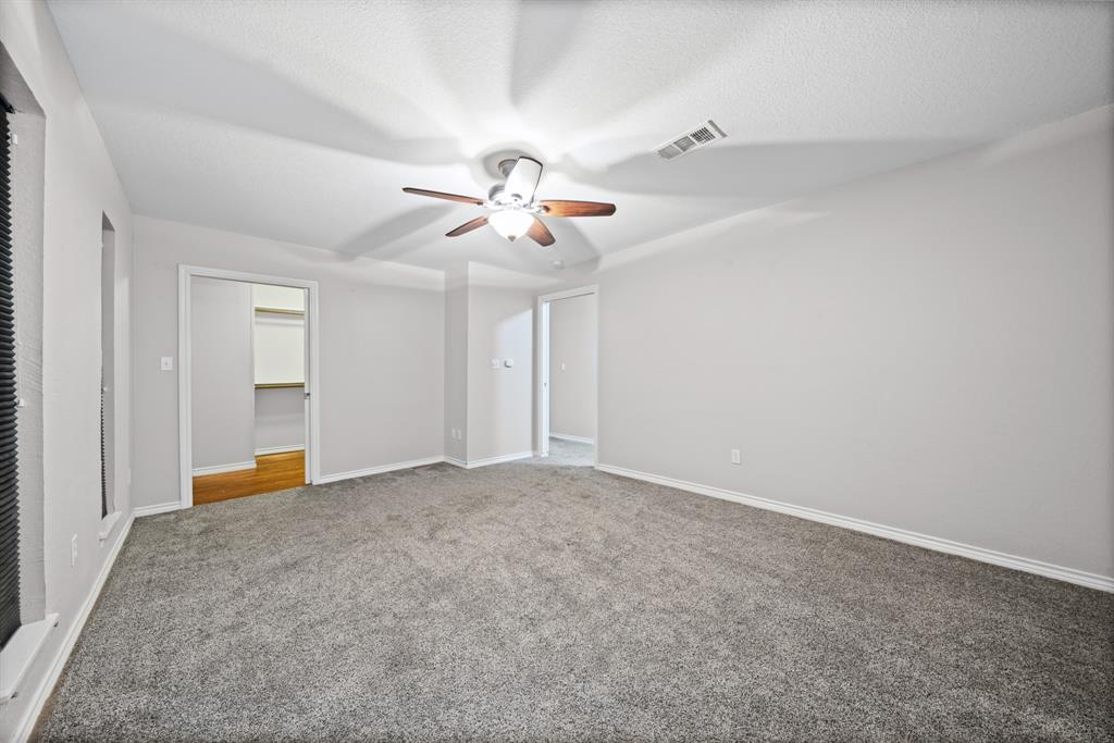 891 HCR 2124 Loop Whitney, TX 76692 - Photo 28 of 40 a view of an empty room with chandelier fan