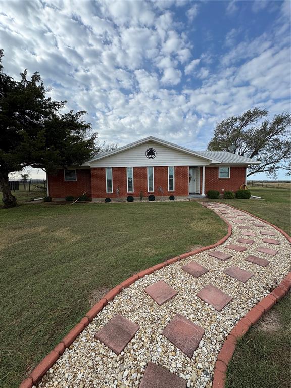 891 HCR 2124 Loop Whitney, TX 76692 - Photo 3 of 40 a view of a house with a big yard and large trees