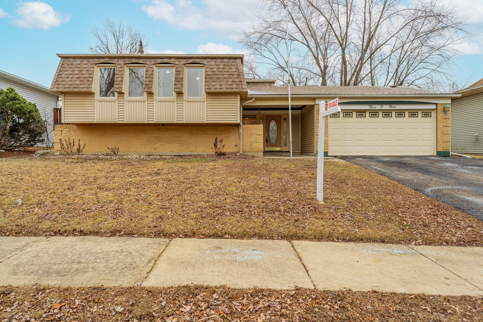 309 Falconridge Way Bolingbrook, IL 60440 - Photo 1 of 34 front view of a house with a dry yard