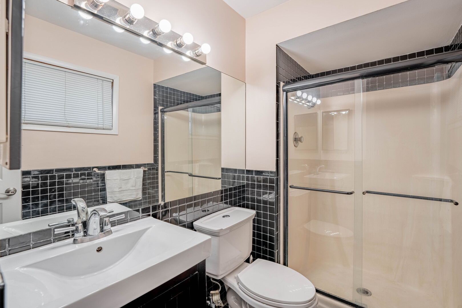 309 Falconridge Way Bolingbrook, IL 60440 - Photo 14 of 34 a bathroom with a sink toilet and shower