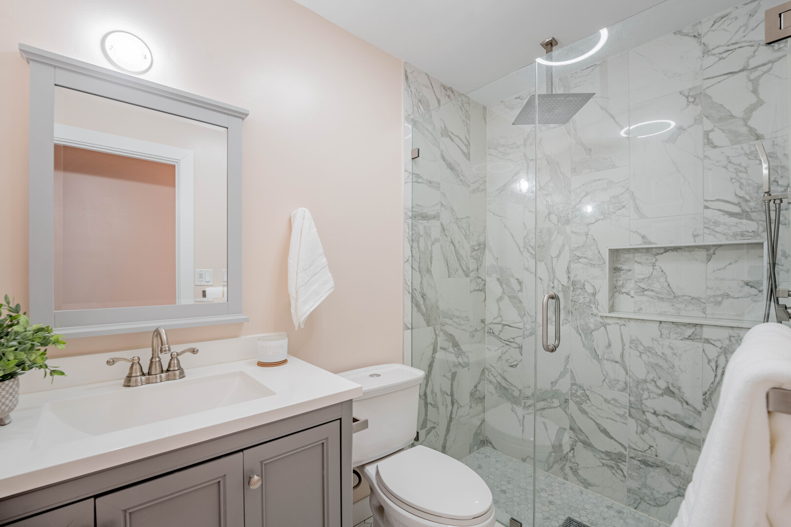 309 Falconridge Way Bolingbrook, IL 60440 - Photo 17 of 34 a bathroom with a sink vanity granite toilet and a mirror