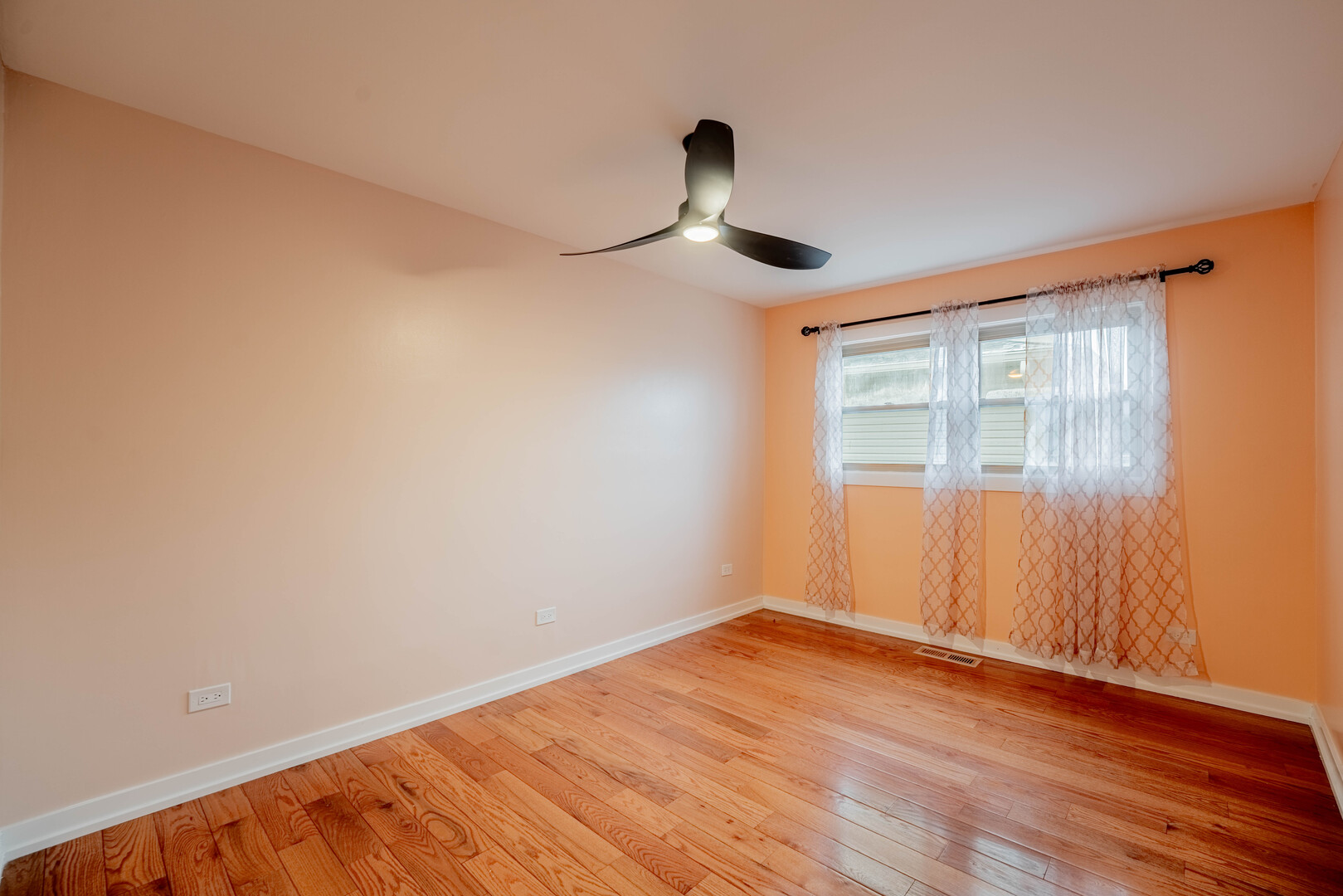 309 Falconridge Way Bolingbrook, IL 60440 - Photo 18 of 34 a view of empty room with wooden floor and fan