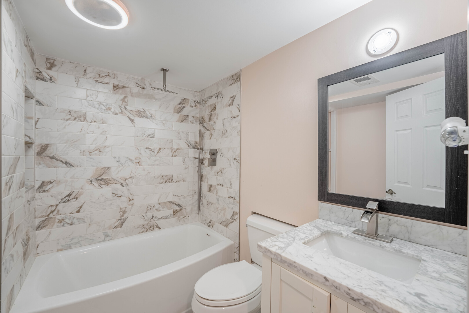 309 Falconridge Way Bolingbrook, IL 60440 - Photo 21 of 34 a bathroom with a granite countertop sink toilet mirror and bathtub