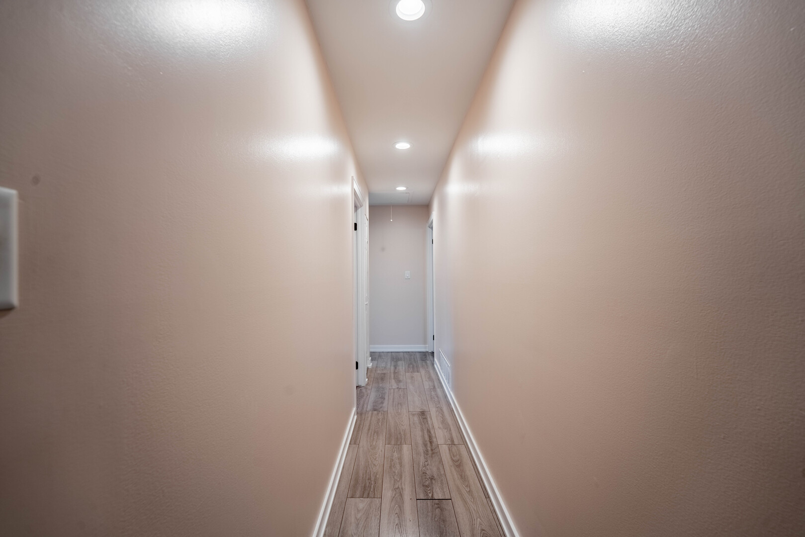 309 Falconridge Way Bolingbrook, IL 60440 - Photo 25 of 34 a view of a hallway with wooden floor