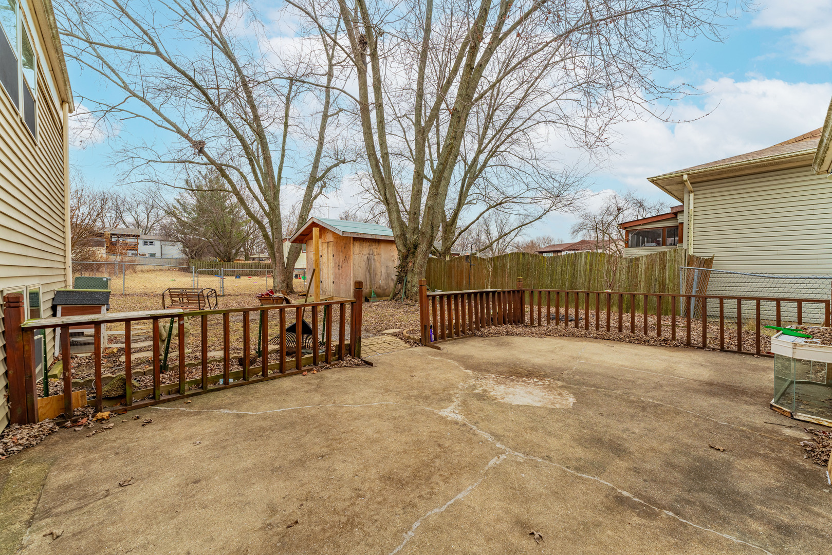 309 Falconridge Way Bolingbrook, IL 60440 - Photo 34 of 34 a view of a street with a fence and trees