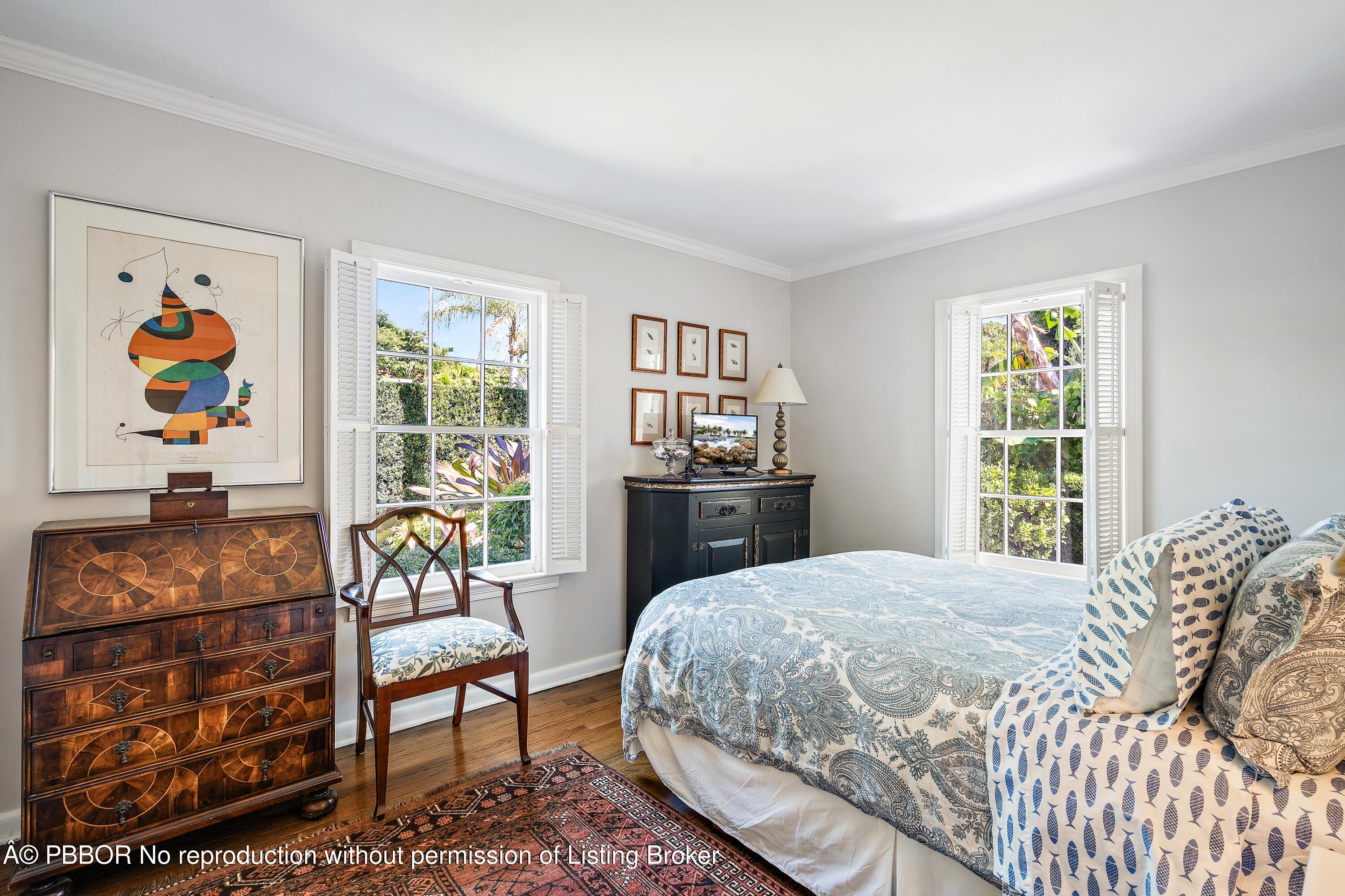 230 Colonial Lane Palm Beach, FL 33480 - Photo 11 of 17 a bedroom with a bed and a couch