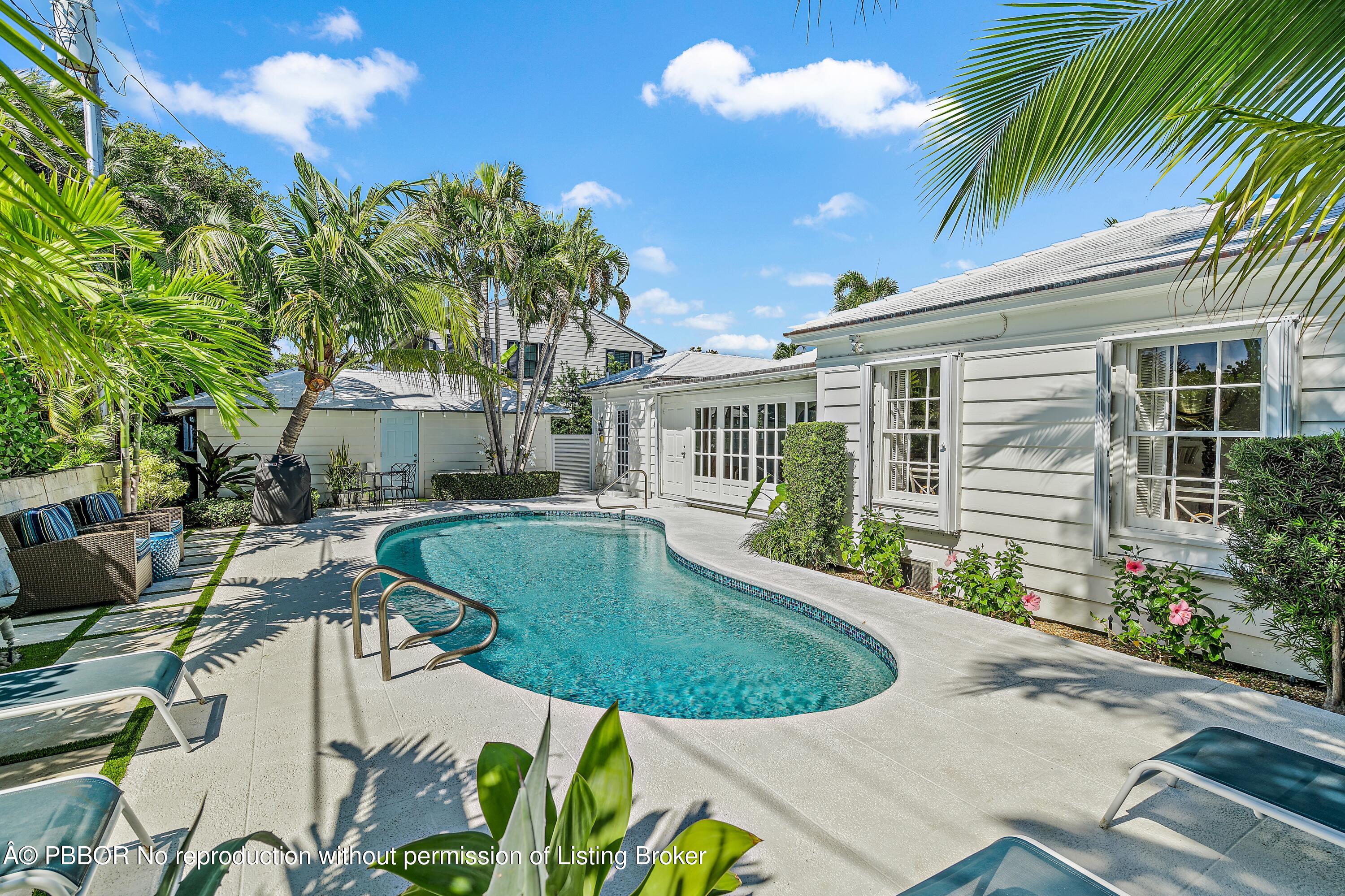 230 Colonial Lane Palm Beach, FL 33480 - Photo 5 of 17 a view of a house with backyard and sitting area