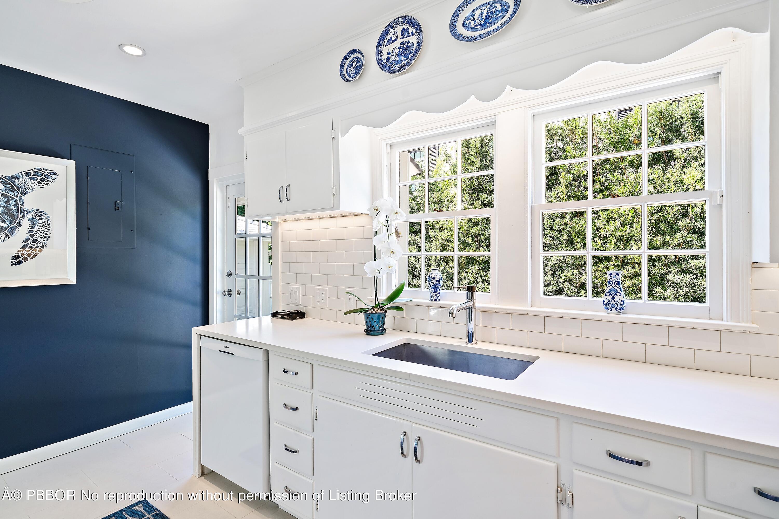 230 Colonial Lane Palm Beach, FL 33480 - Photo 6 of 17 a kitchen with a sink and a window